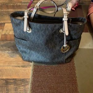 Michael Kohr brown and tan purse